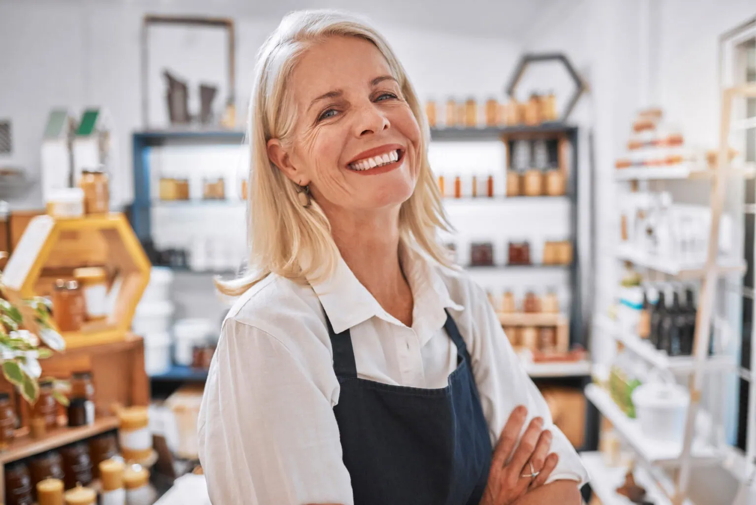 Honey shop portrait of senior woman, small business owner or retail store manager with pride in sal.